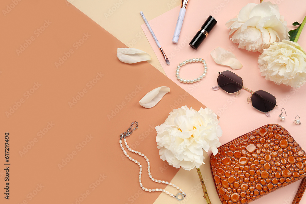 Composition with female accessories, lipstick and beautiful peony flowers on color background