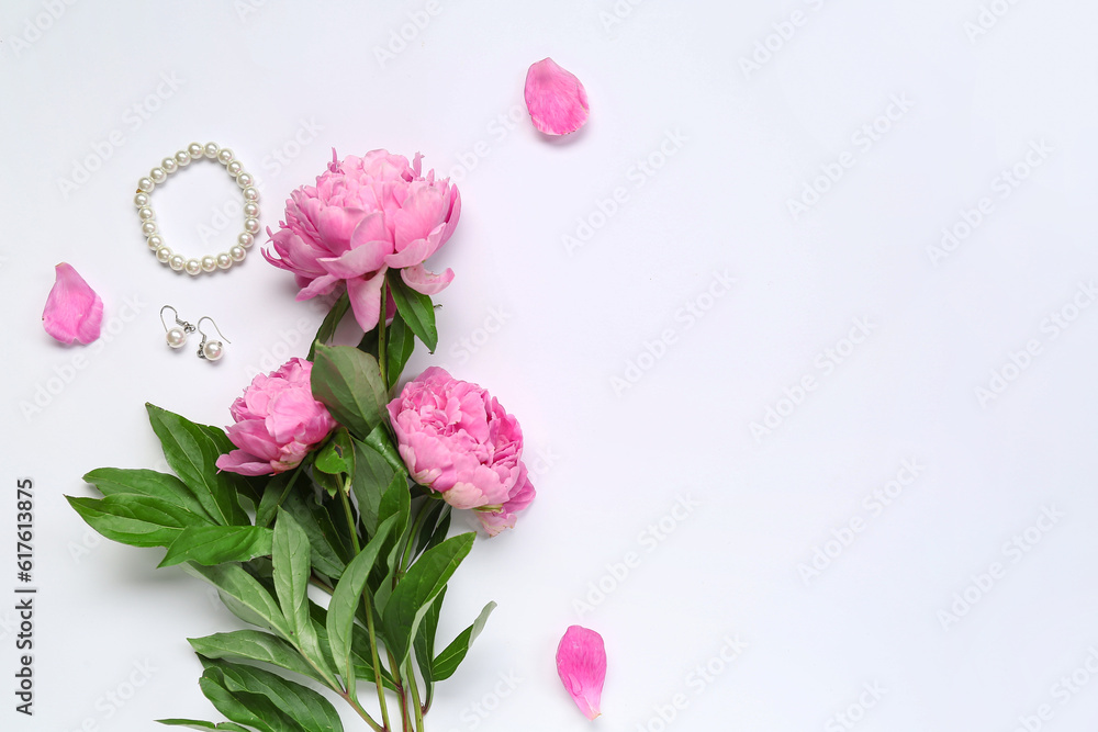 Composition with stylish female accessories and beautiful peony flowers isolated on white background