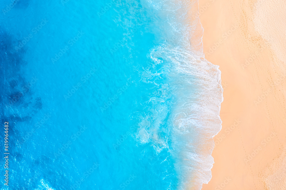 Coast as a background from top view.  Waves and beach. Aerial landscape. Azure water background from