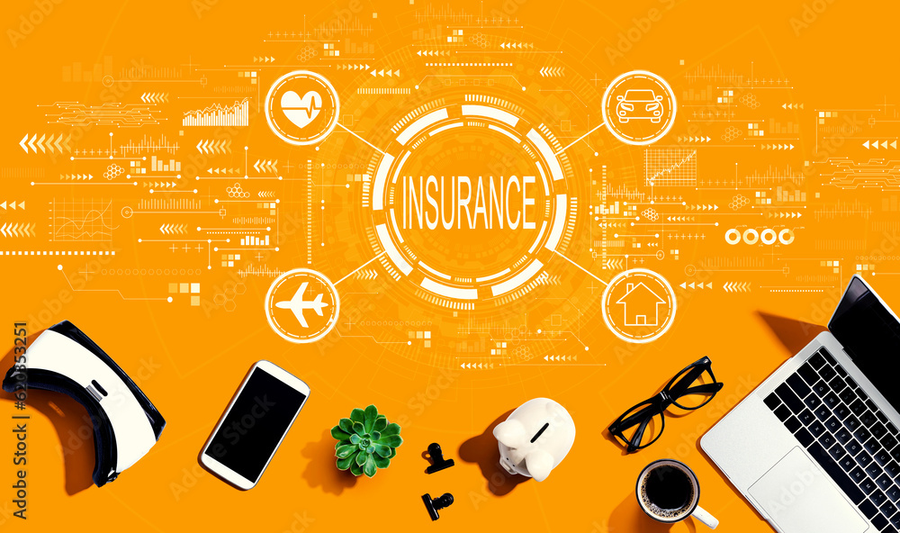 Insurance concept with electronic gadgets and office supplies - flat lay