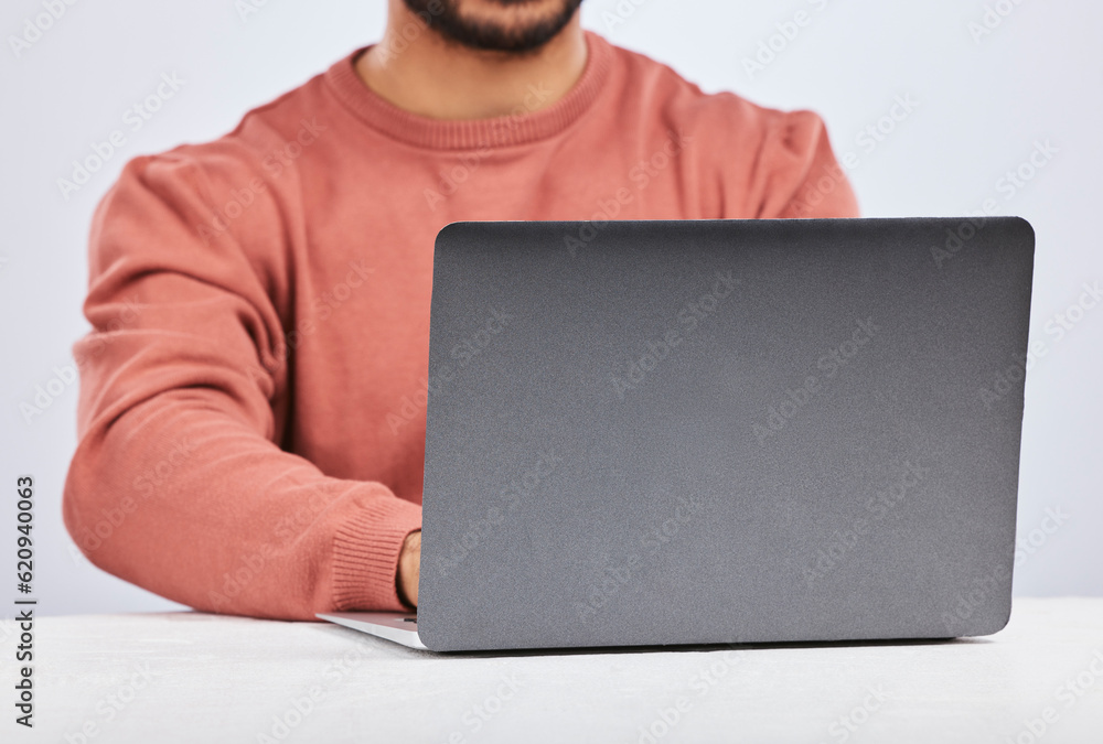 Laptop space, IT and closeup of man in studio, white background or programming digital code. Model, 