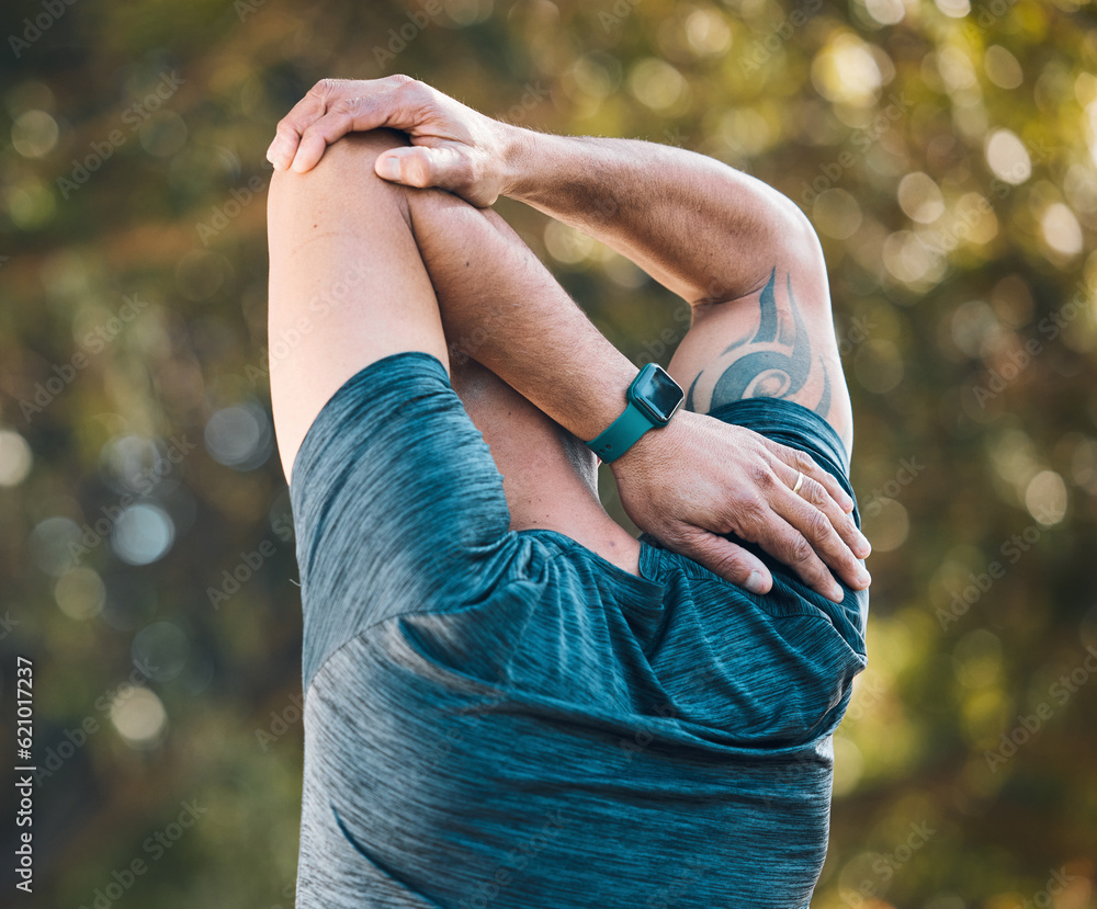 Arm stretching, outdoor and man in a park with sport injury and muscle pain from fitness and workout