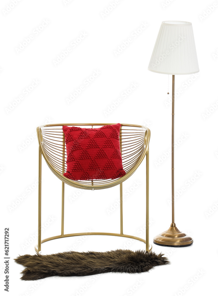 Golden armchair with lamp and rug on white background