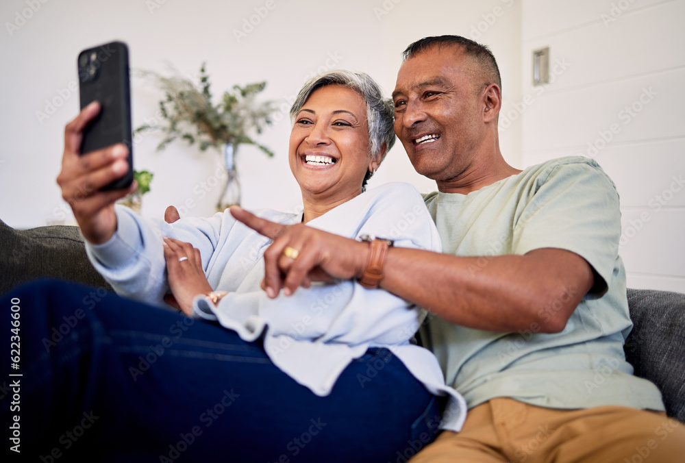 Love, phone or happy senior couple pointing at social media post, retirement news article or relatio