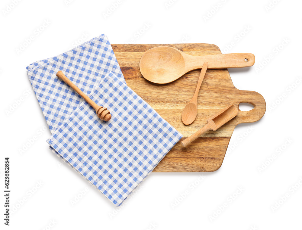 Wooden kitchen utensils and clean napkins isolated on white background