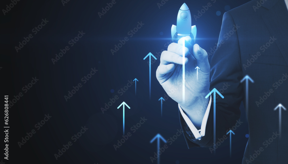 Close up of male hand pointing at glowing flying blue rocket on dark background with mock up place. 