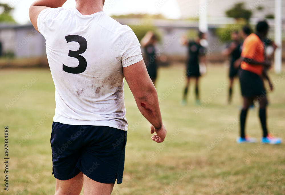 Lifes short, spend it on a rugby field. Cropped shot of a man playing a game of rugby with his teamm