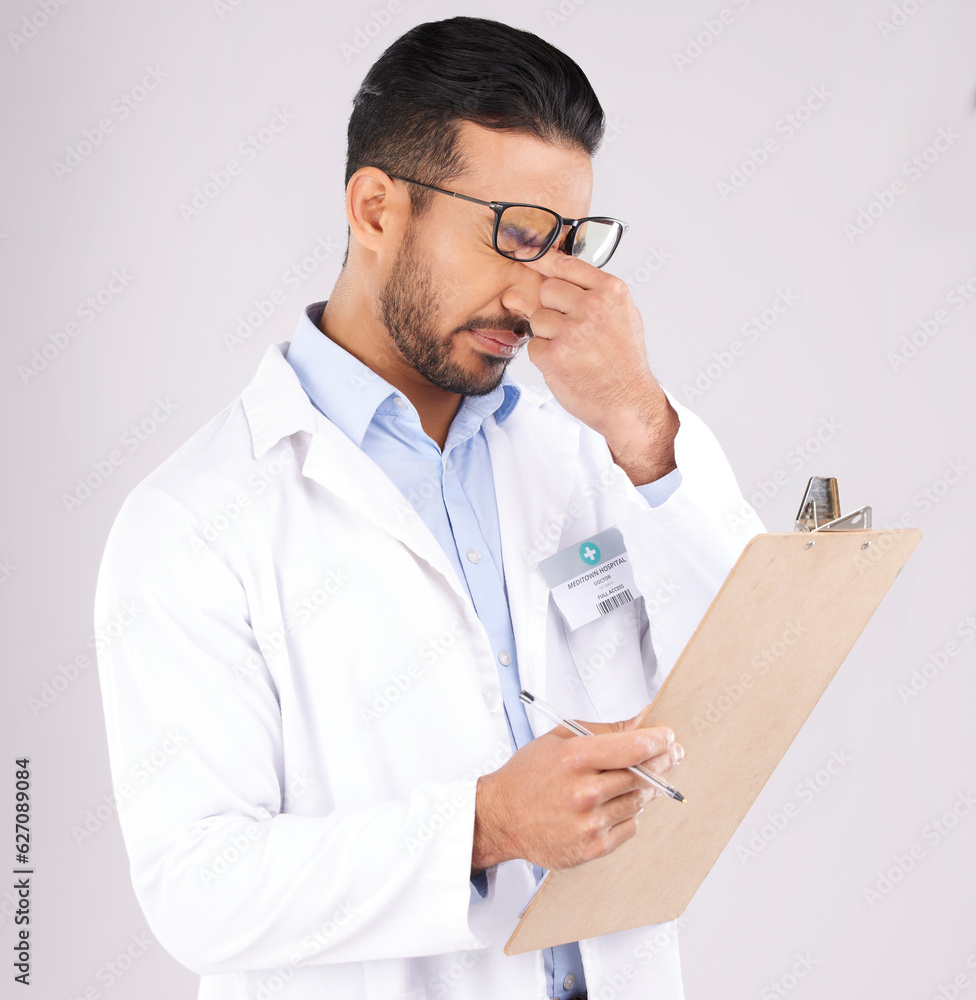 Stress, checklist and man doctor in a studio for a medical diagnosis or wellness treatment. Burnout,