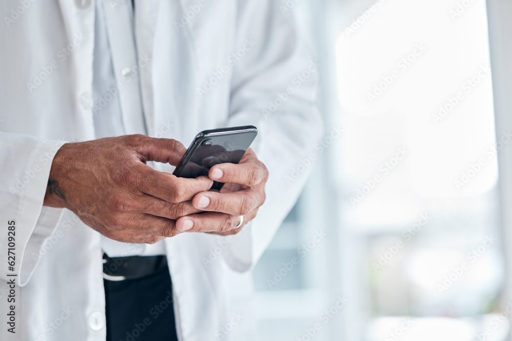 Phone, hands and doctor typing in hospital for research, telehealth and healthcare. Smartphone, medi