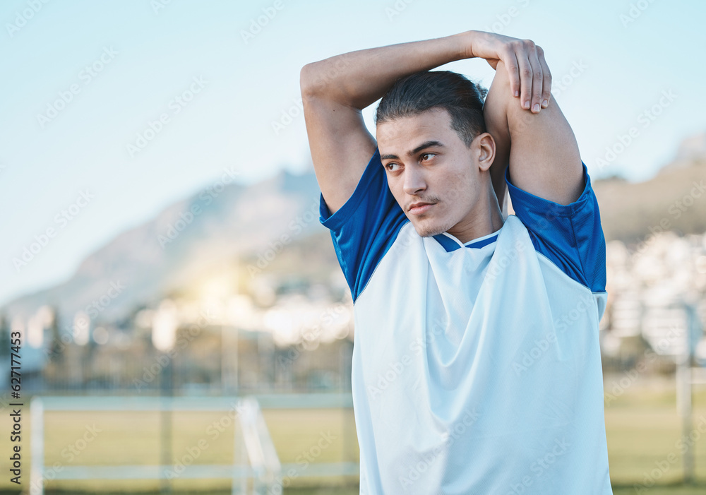 Thinking, man or soccer player stretching arms on football field in training, exercise or workout in