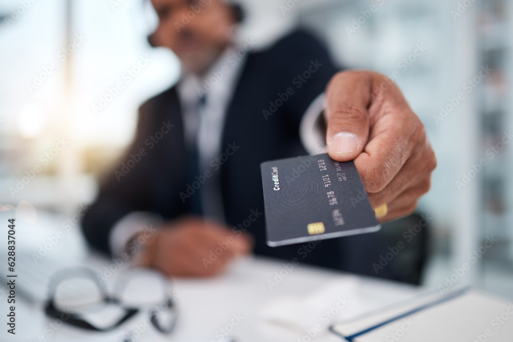 Hand, giving credit card and man in office for payment, ecommerce or budget for shopping in call cen