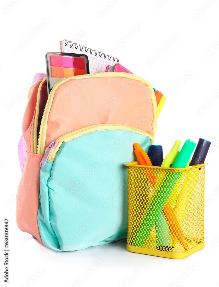 Colorful school backpack with different stationery on white background