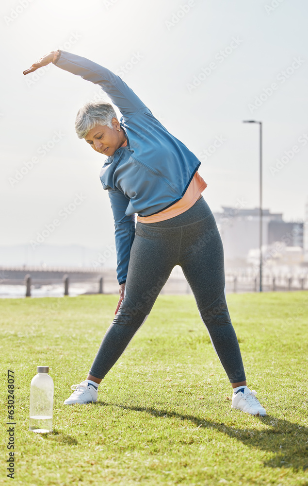 Senior woman, stretching and exercise in park with health, wellness and training in nature. Pilates,