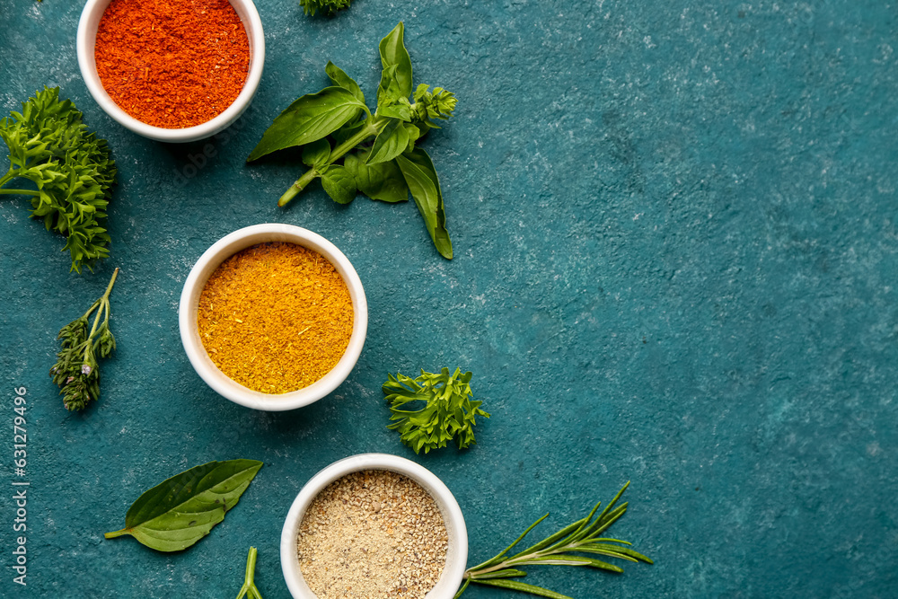 Composition with fresh spices and herbs on color background