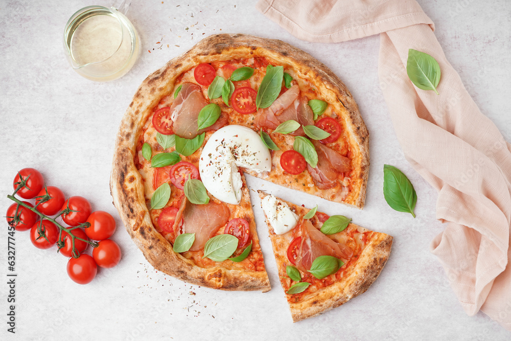 Tasty pizza with Burrata cheese on light background