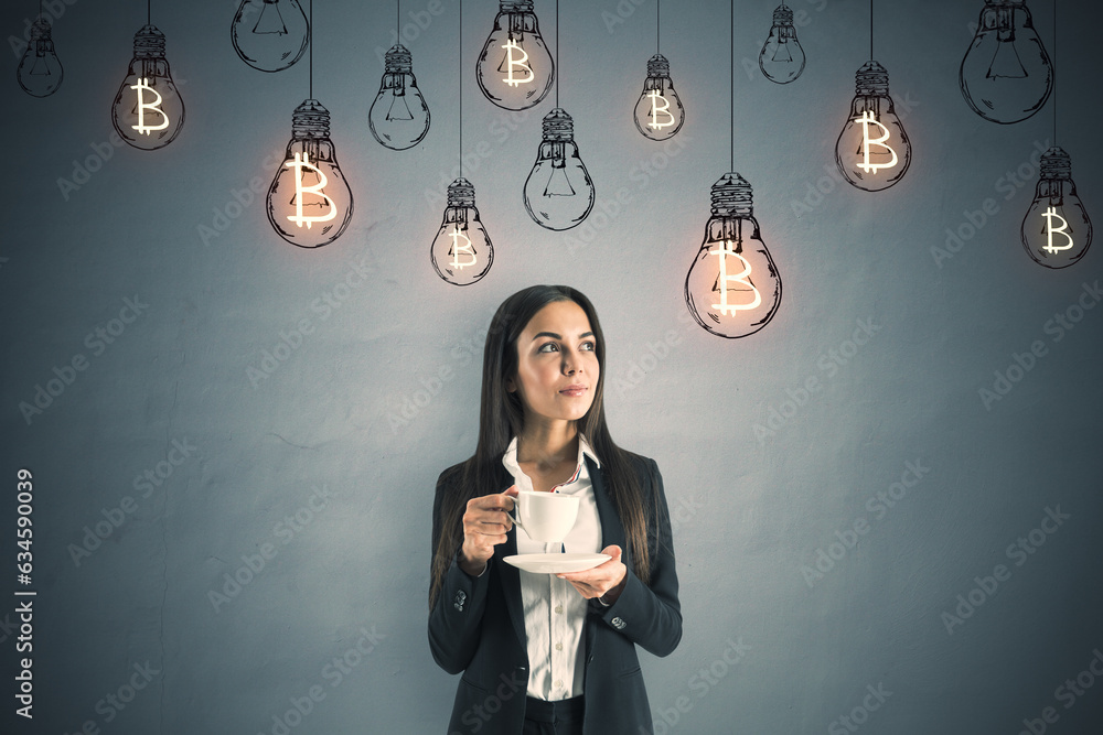 Portrait of a young businesswoman with a cup of coffee and lightbulbs hanging above her head. Idea c