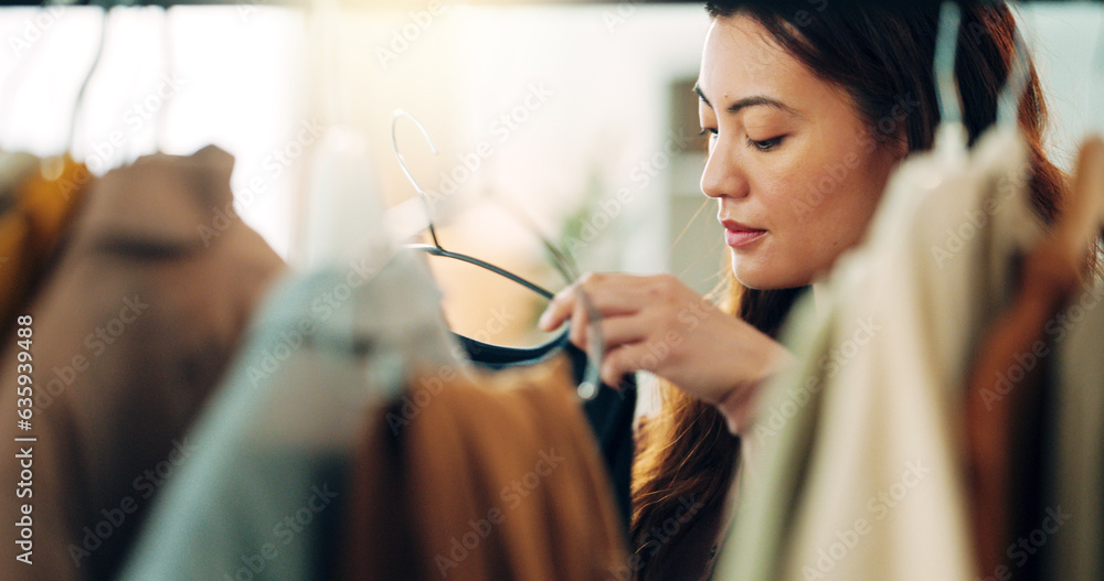 Fashion, shopping and customer with a woman in a store for retail while looking at clothes to buy or