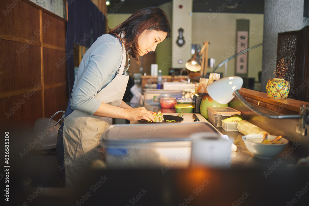 Chinese food, chef and an asian woman in a sushi restaurant to serve a traditional meal for nutritio