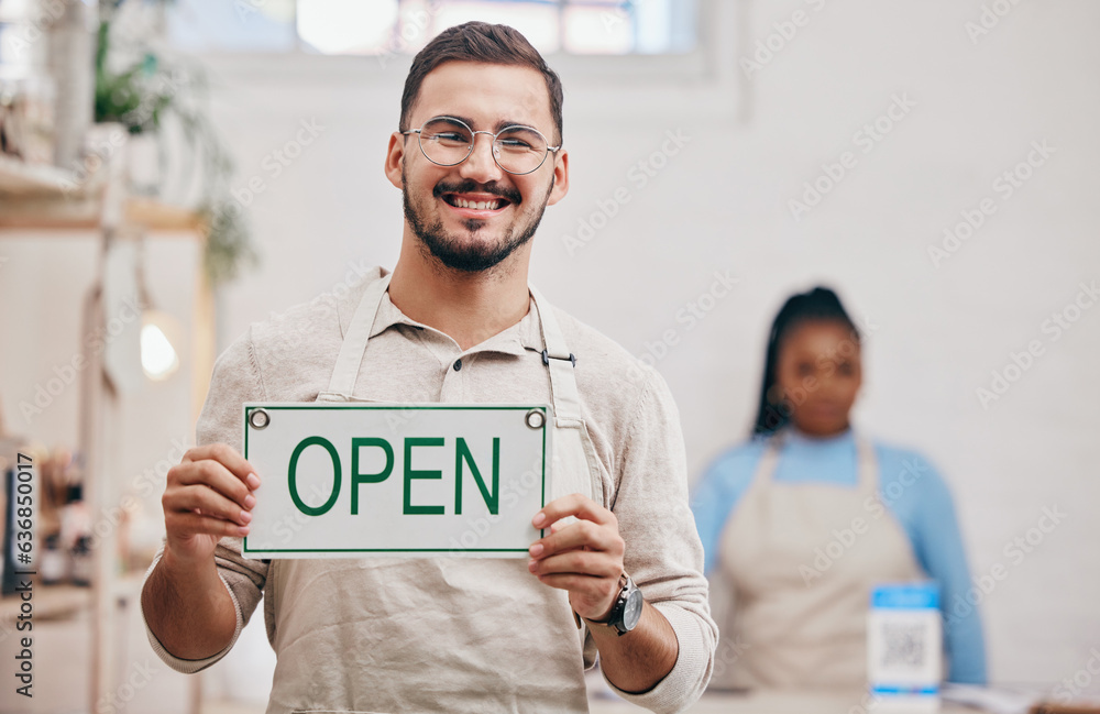 Open, sign and man with small business or restaurant happy for service in a coffee shop, cafe or sto