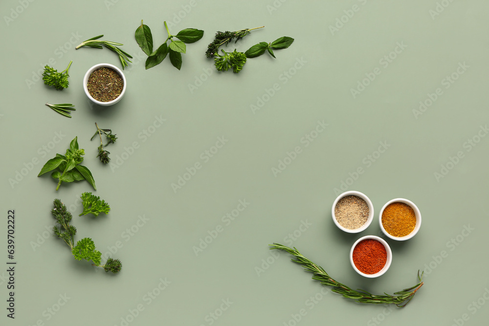 Composition with fresh herbs and aromatic spices on color background