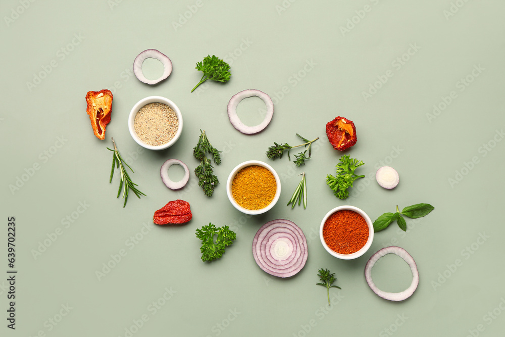 Composition with fresh aromatic spices, vegetables and herbs on color background