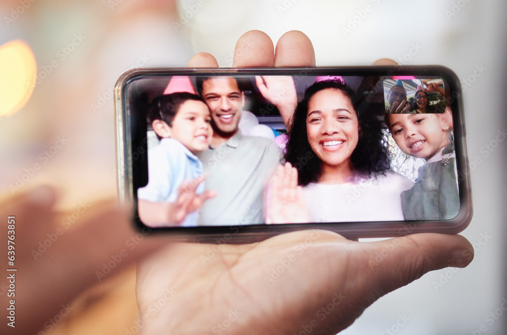 Video call, hand and phone screen with family to wave for birthday party at home with communication 