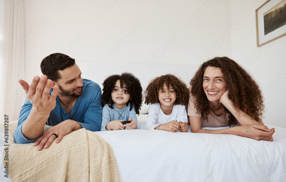 Parents, kids and watching tv on bed, together and relax with talking, choice or happy for movie in 