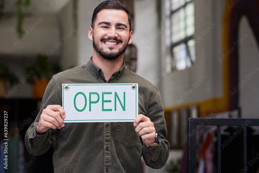 Open, sign and happy business owner working in retail, store or start of service in restaurant, cafe