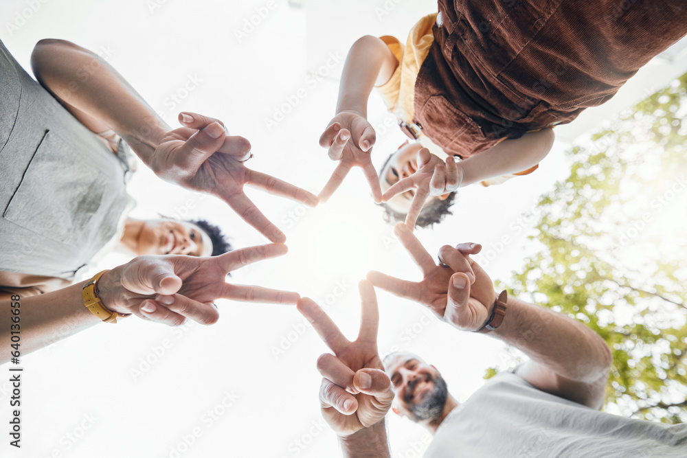 Family, hands together and star fingers outdoor in low angle, happy and bonding. Father, mother and 