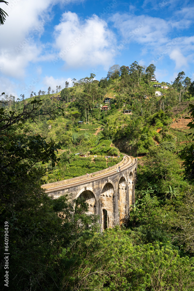 Famous Nine Arch Bridge on a sunny day in Ella, train journey Sri Lanka