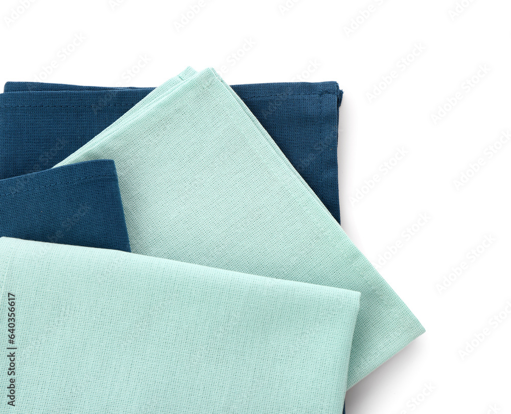 Set of folded clean napkins isolated on white background, closeup