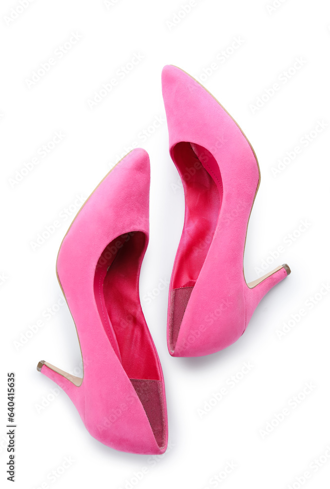 Stylish pink high heels on white background