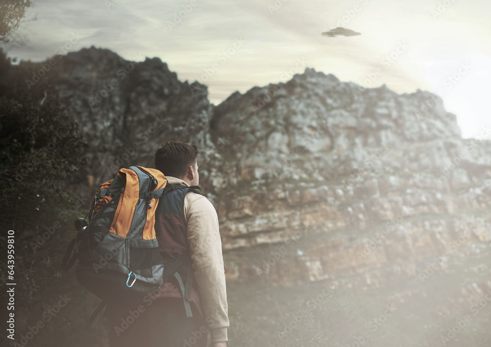 Hiking, man and ufo at mountains, spaceship or mystery adventure in countryside to travel. Trekking,