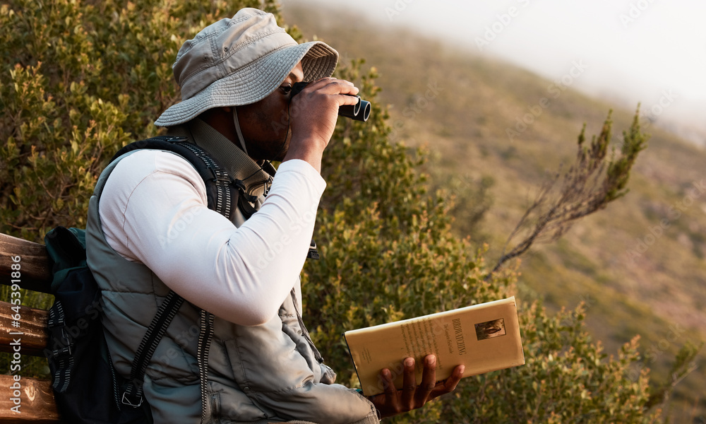 Book, binocular or man bird watching in nature on trekking adventure journey for wellness or peace. 