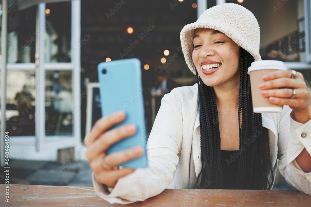 Phone, selfie and woman with a coffee in the city at a cafe on a weekend adventure with happiness. Smile, fun and young female person drinking latte and taking a picture on cellphone outdoor in town.