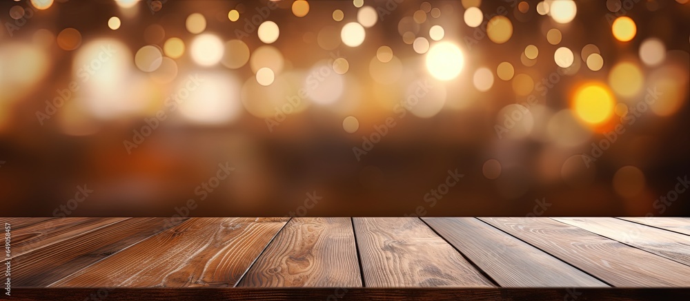 coffee shop interior with empty wood table top and bokeh background