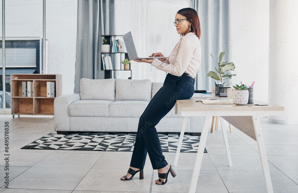 Woman in modern office with glasses, laptop and reading email, HR schedule and online report feedback. Website, networking or communication on digital app, businesswoman at human resources agency