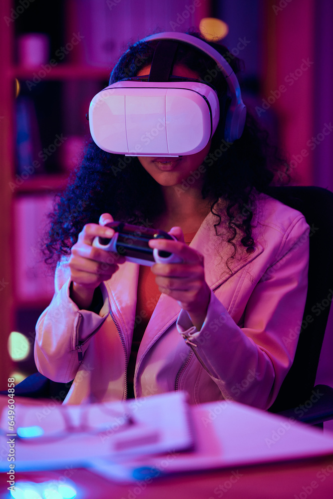 Virtual reality, glasses and woman, gaming developer or programmer for game software and futuristic electronics at night. Information technology gamer with vr vision, controller and metaverse in neon
