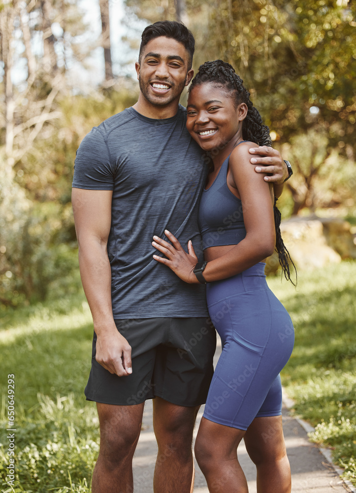 Fitness, nature and portrait of couple hug outdoors for exercise, training and running for cardio workout. Dating, happy and interracial man and woman embrace for wellness, healthy body and sports