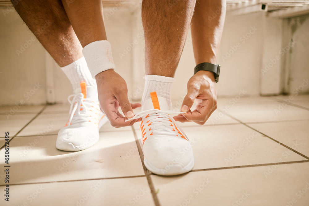 Locker room, fitness and person tie shoes for training, exercise and workout for practice or match. Sports, gym and closeup of athlete tying laces for performance, wellness and ready for competition