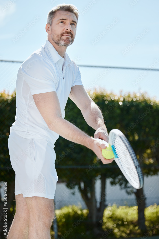 Tennis, serve and game with a sports man on a court, playing a match for competition in summer. Racket, ball and start with a mature athlete outdoor for fitness, training or hobby for recreation