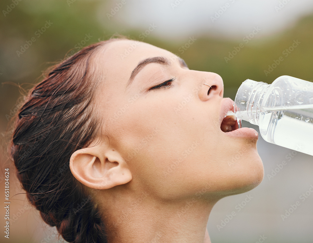 Outdoor, wellness and woman drinking water, fitness and tired with fatigue, nutrition and workout. Person, runner and athlete with hydration, liquid or thirsty with health, bottle with aqua or sports