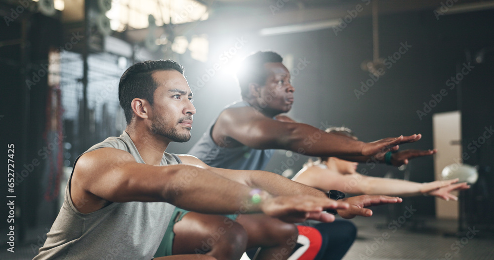Gym, group of people in class for muscle building endurance, strong body and balance power in fitness. Commitment, men and woman with personal trainer for workout, motivation and exercise challenge.