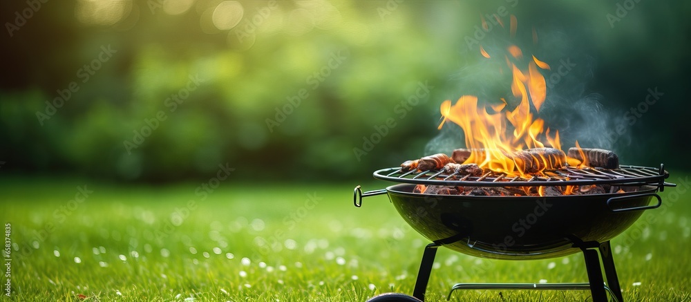 Flame on grass barbecue grill backdrop