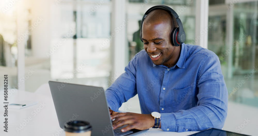 Businessman, laptop and headset by listening to music, podcast or radio for wellness while working. Black person, consultant or employee for typing, report or internet by email for message to client