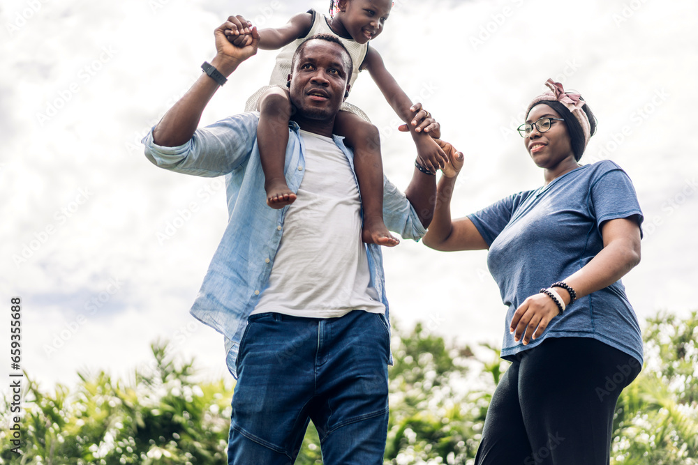 Portrait of enjoy happy love black family. play, having fun, daughter, parenthood, care, african american father and mother with little african girl child smiling moments good time at home