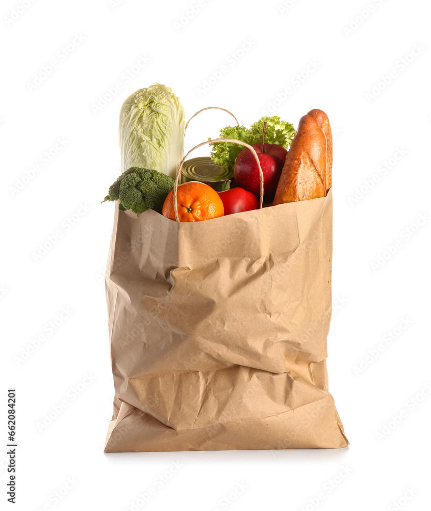 Paper bag with food on white background. Grocery shopping