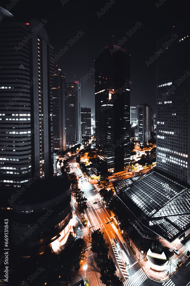 Skyscrapers towering above the cityscape of Nishi-Shinjuku, Tokyo, Japan at night