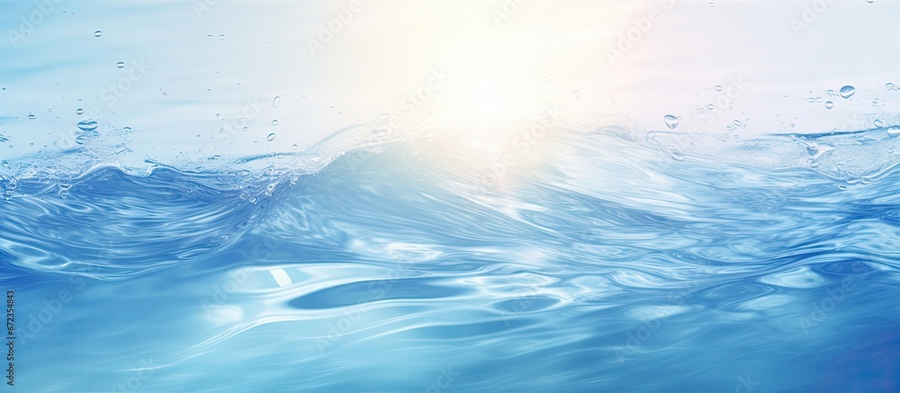 Blurry cream colored water surface with splashes and reflections creating a transparent and calm texture A stylish and abstract background inspired by nature trends Sunlight creates waves o