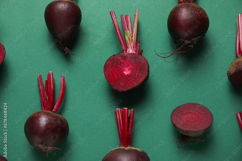 Fresh beets on green background